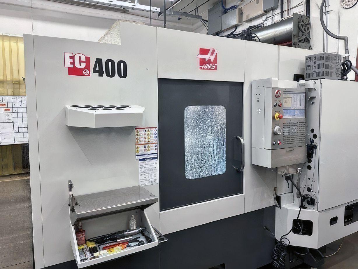 HAAS EC400 #A6CKsStXEeY4AXyaHnRp7b1Zz