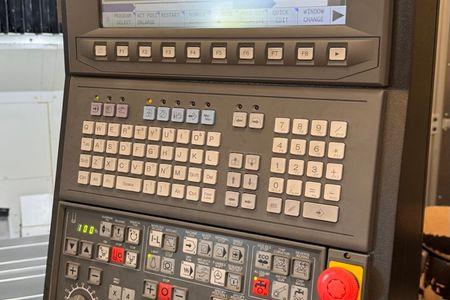 OKUMA GENOS M560V #11452